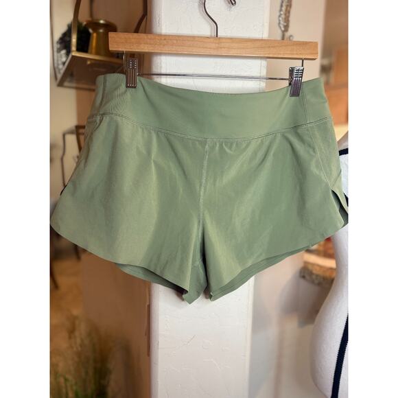 ATHLETA RUN WITH IT Olive Green Running Shorts Size L 10-14 - Picture 2 of 5